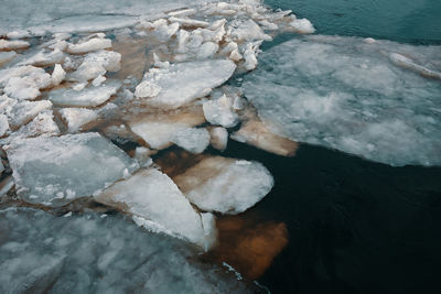 High angle view of frozen sea shore