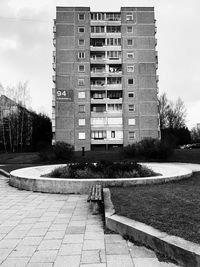 Exterior of building by street against sky