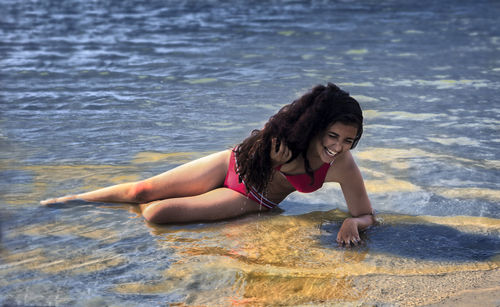 Full length of woman at beach