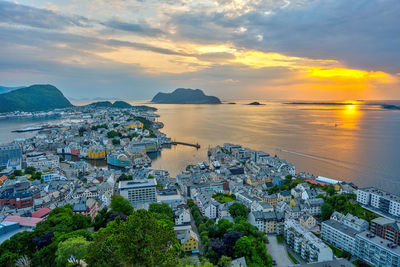 The city of alesund in norway during a beautiful sunset