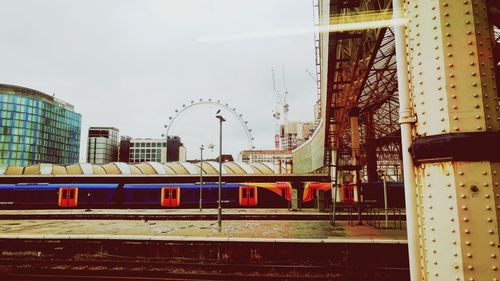 Close-up of train against sky