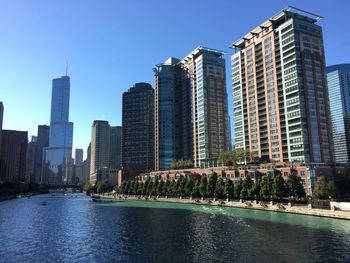 View of modern buildings against clear sky