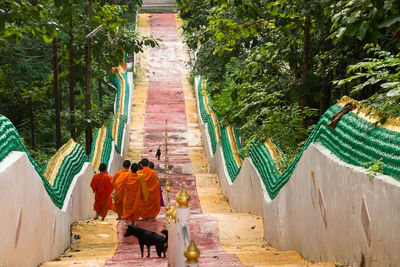 High angle view of monks walking on steps