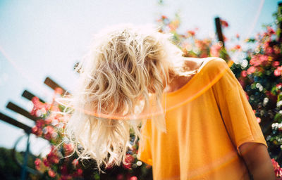 Low angle view of woman with blond hair