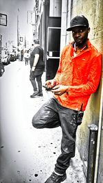 Full length portrait of man standing outdoors