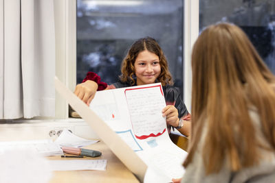 Girls sitting in classroom