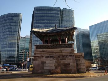 Low angle view of skyscrapers against sky