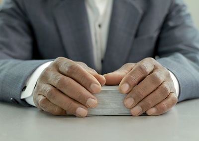 Praying to god for forgiveness caribbean man praying  with people stock image stock photo