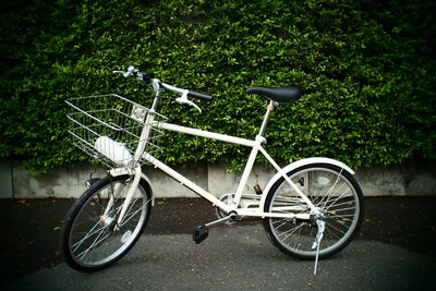 Bicycle in basket on field