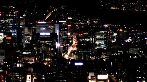 Illuminated cityscape at night