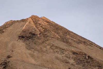 Low angle view of desert against sky