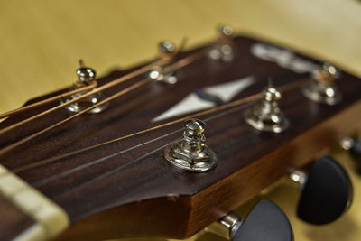 High angle view of guitar on table