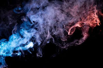 Close-up of smoke against black background