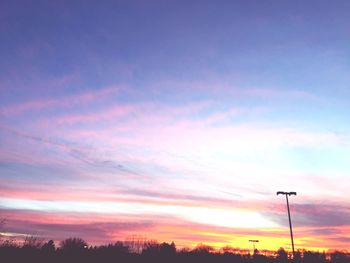 Low angle view of cloudy sky at sunset