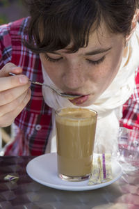 Close-up of hand holding coffee