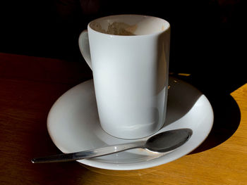 Close-up of coffee cup on table