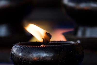 Close-up of burning candle