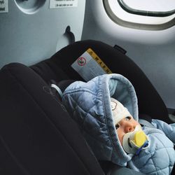 Close-up of baby boy in airplane