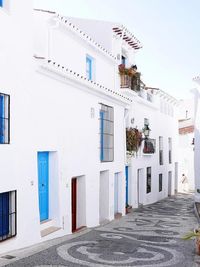 Alley amidst buildings in city