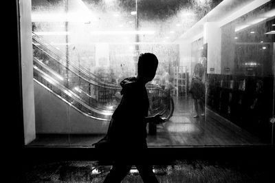 Reflection of people on glass