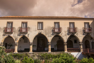 Exterior of old building against sky in city