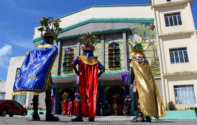 Group of people in front of building