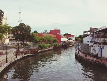 View of canal along buildings