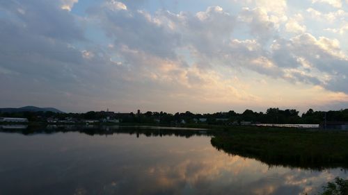 Reflection of clouds in calm lake