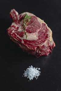 Close-up of ice cream over black background