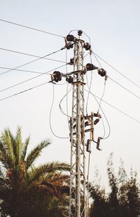 Electricity pylon against sky