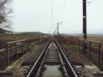 Railroad tracks against sky