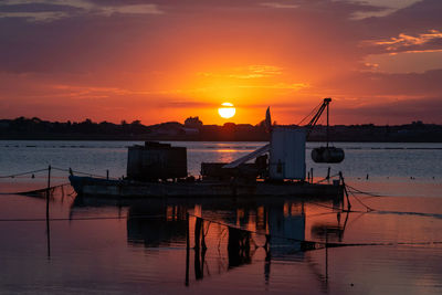 Beautiful sunset. salt extraction plant. salt mining lake.