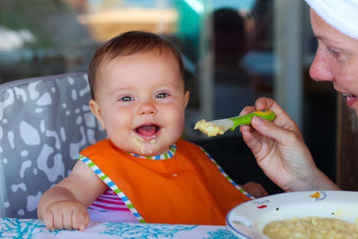 Portrait of boy eating food