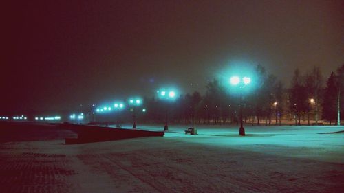 Illuminated street light at night