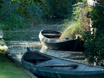 Boats moored at river