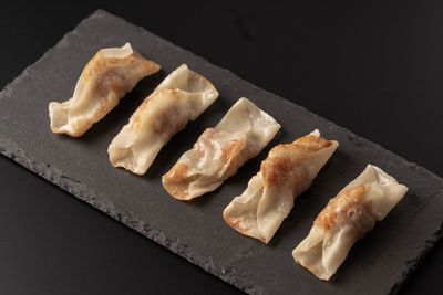 High angle view of meat in plate on table