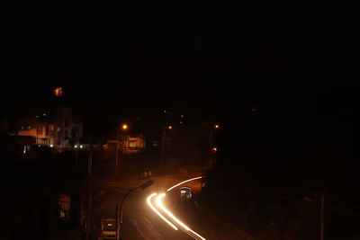 High angle view of illuminated street at night