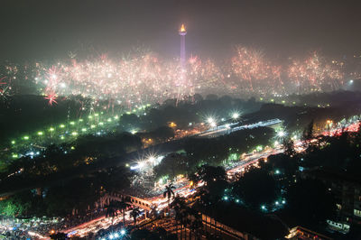 Firework display at night