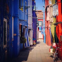 Narrow alley along buildings