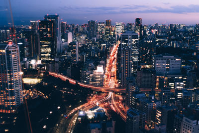 High angle view of illuminated city 