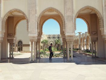 Tourists in front of historical building