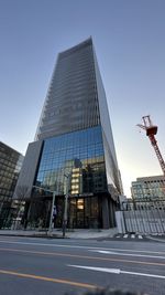 Low angle view of skyscrapers against clear sky