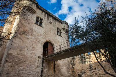 Low angle view of old building against sky