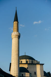 Low angle view of mosque in sarajevo against sky