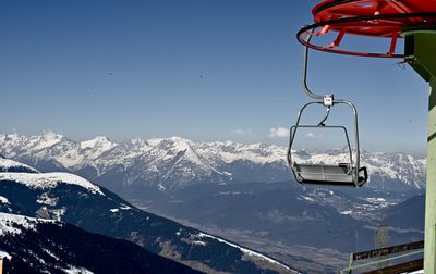 Scenic view of snowcapped mountains against clear sky