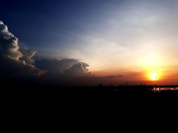 Scenic view of silhouette landscape against sky during sunset