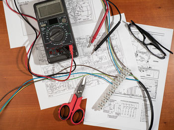 High angle view of telephone on table