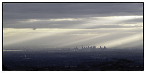 Scenic view of cloudy sky over city