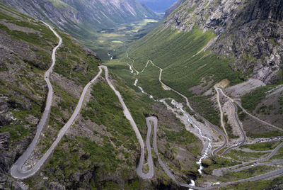 High angle view of road amidst mountains