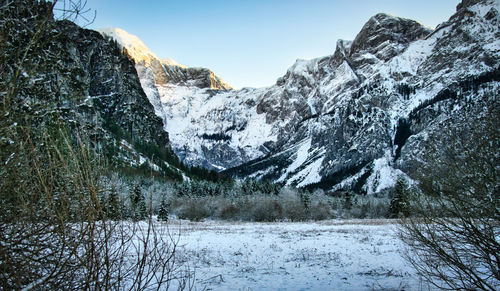 Scenic view of snowcapped mountains against sky